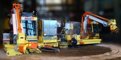 ANDROMAT® Circular Carriage system with two AMX manipulators on a rotary track